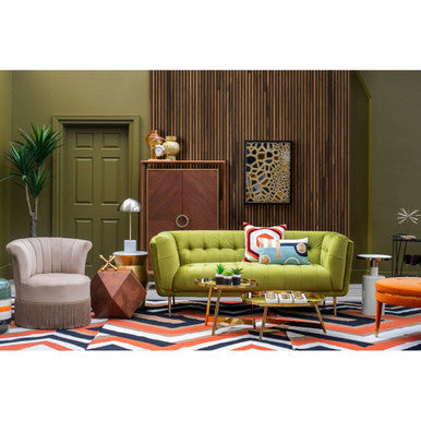 Stylish living room with green sofa and decorative Rectangular Cushion on a coffee table