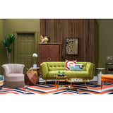 Stylish living room with green sofa and decorative Rectangular Cushion on a coffee table