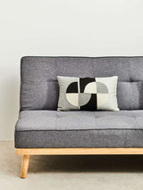 Orsina Rectangular Cushion with a modern geometric design on a grey sofa