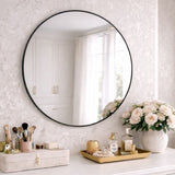 Jobu Home Circle Mirror with a sleek black frame, perfect for modern home interiors