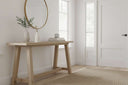 Stylish Ribbed Doorstop in a minimalist interior with a wooden table and large mirror