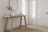 Stylish Ribbed Doorstop in a minimalist interior with a wooden table and large mirror
