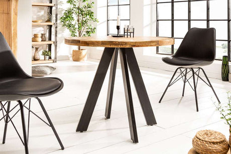 Verty Furniture Round Dining Table with a Wooden Top and Modern Black Legs in a Stylish Dining Room
