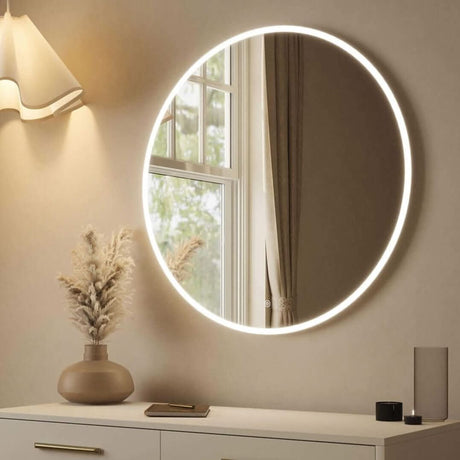 Round Mirror with LED Backlighting, ideal for brightening up any room elegantly