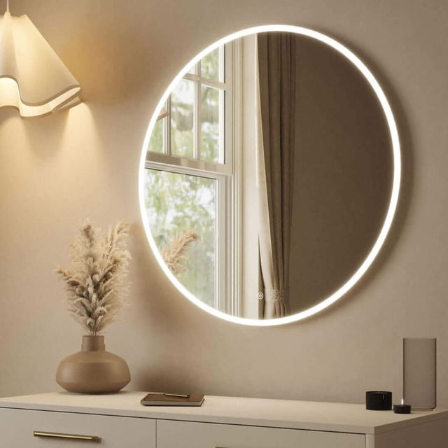 Round Mirror with LED Backlighting, ideal for brightening up any room elegantly