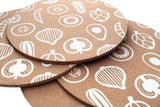 Set of round placemats by Orsina featuring decorative leaf and nut patterns for stylish dining