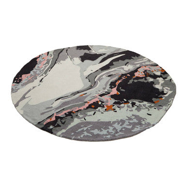 Orsina Round Rug featuring a stylish abstract pattern in grey, black, and pink tones for modern decor