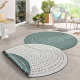 Stylish round rug in green and white with a modern dotted pattern for home decor