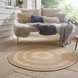 Beautiful round rug made of natural fibres, perfect for enhancing outdoor seating areas