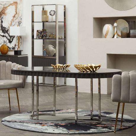 Orsina Round Rug placed under a modern round table in a stylish living room setting