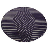 Orsina Round Rug featuring a modern geometric pattern in navy blue and white stripes