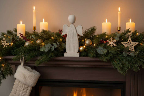 Rustic Angel Figurine on a Festive Mantel with Candles and Christmas Decorations