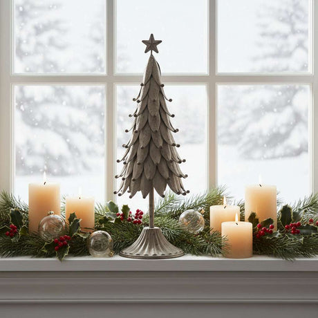 Rustic Decorative Tree on a windowsill with candles and festive greenery for Christmas room decorations