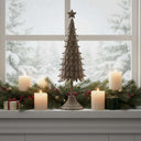 Rustic Decorative Tree displayed on a windowsill surrounded by candles and festive greenery
