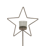 Rustic Star candle holder with a glass votive, ideal for Christmas decor and holiday settings