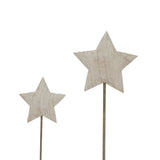 Pair of rustic star decorations on metal sticks for festive Christmas room decor