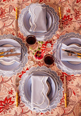 Casa by Josephine Jenno floral tablecloth with elegant plates and napkins set for dining