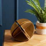 Elegant Orsina sculpture featuring a geometric design in a gold finish, perfect for modern decor