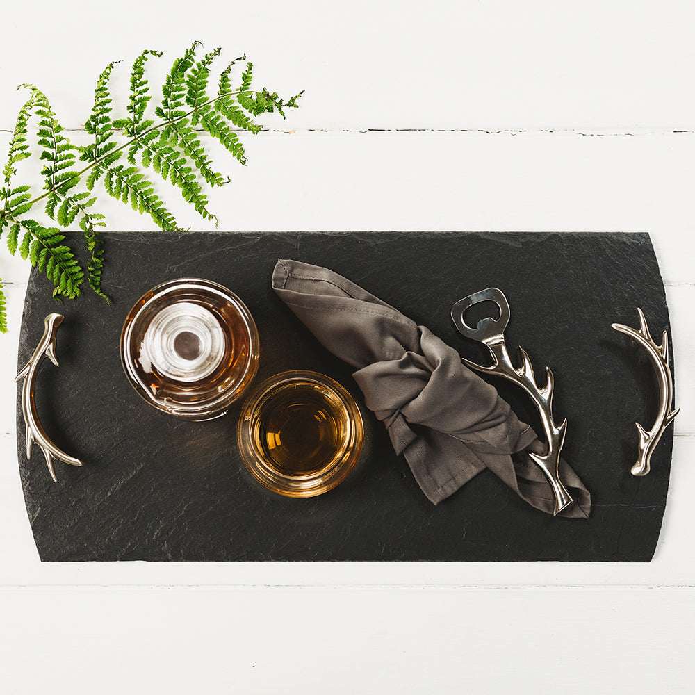 Elegant Slate Serving Tray with antler handles and stylish drinks setup
