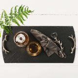 Elegant Slate Serving Tray with antler handles and stylish drinks setup