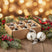 Set of Baubles in White and Silver, displayed with festive greenery and lights for Christmas decoration