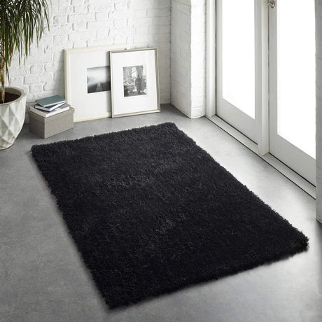 Plush black shaggy rug placed in a modern living space with natural light