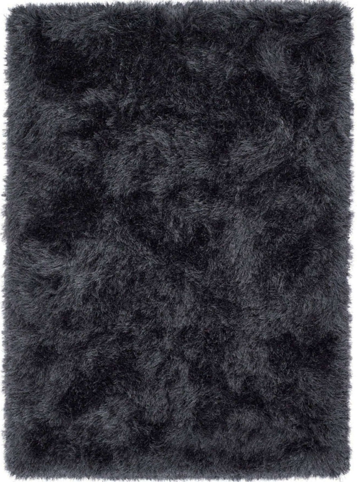 Soft black shaggy rug with a plush texture for a warm and cozy home decor