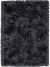 Soft black shaggy rug with a plush texture for a warm and cozy home decor
