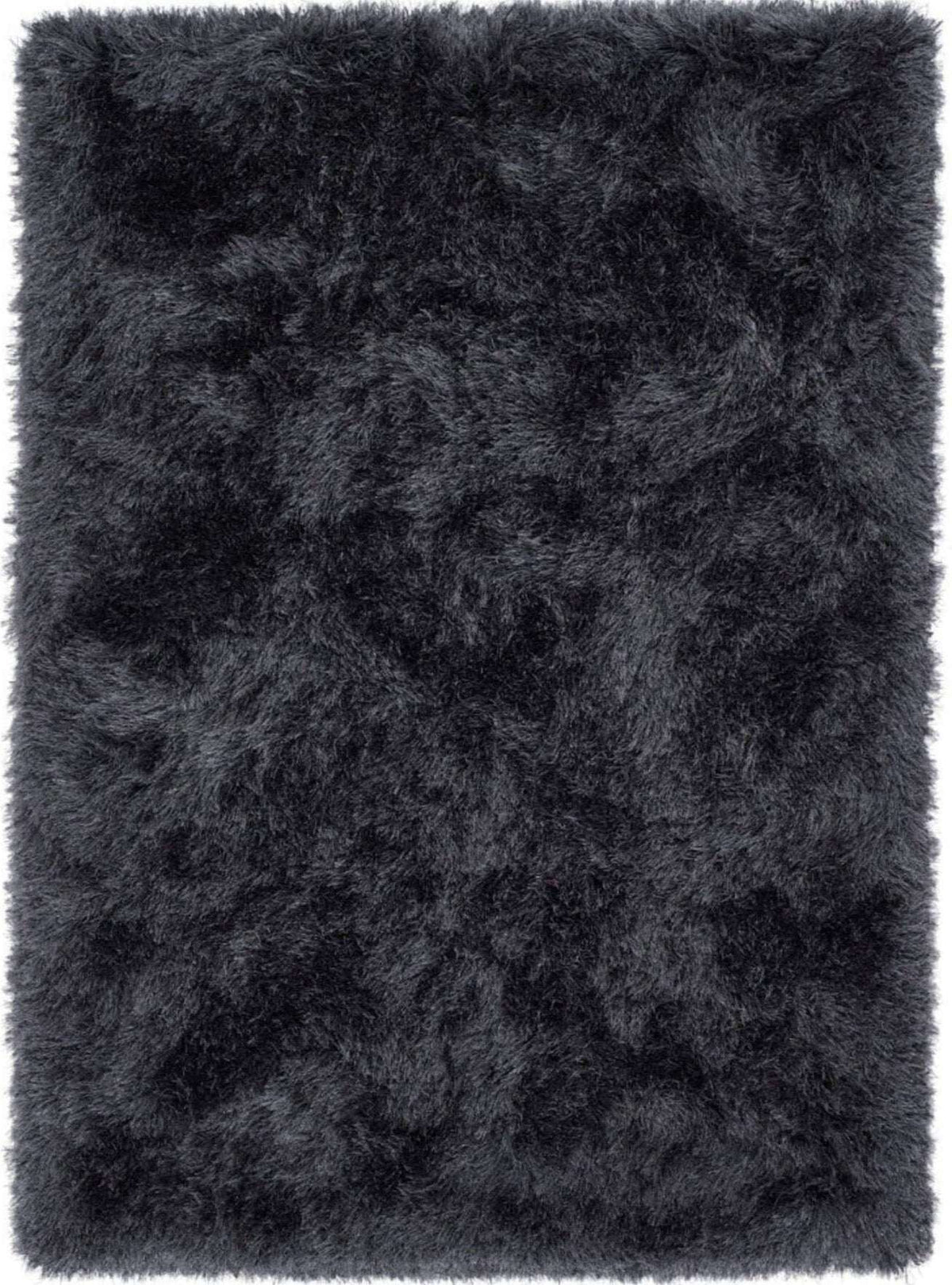 Soft black shaggy rug with a plush texture for a warm and cozy home decor