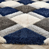 Geometric pattern shaggy rug in cream, grey and navy blue, adding comfort to your living space