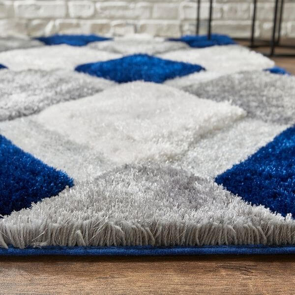 Blue and grey patterned shaggy rug featuring a soft, plush texture for cosy living spaces