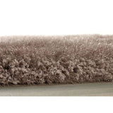 Close-up of a soft, plush Shaggy Rug in a muted grey colour for a cosy home atmosphere