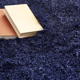 Soft navy Shaggy Rug with plush texture, perfect for adding warmth to your living space