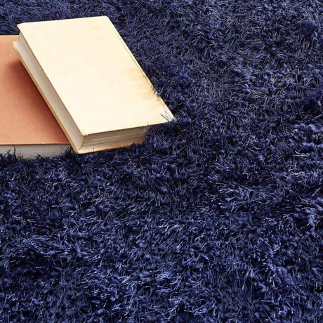 Soft navy Shaggy Rug with plush texture, perfect for adding warmth to your living space