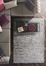 Elegant shaggy rug featuring a textured design, placed in a stylish living room setting
