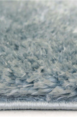 Soft light blue shaggy rug with a thick, plush texture for comfortable warmth and style