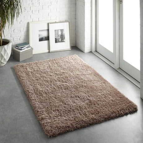 Soft and plush cream Shaggy Rug perfect for adding warmth to any room