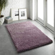 Soft and plush shaggy rug in purple, perfect for adding warmth to any living space
