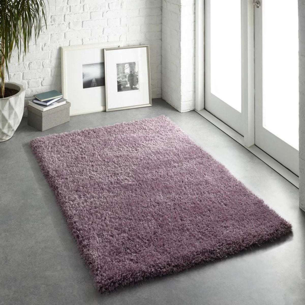 Soft and plush shaggy rug in purple, perfect for adding warmth to any living space