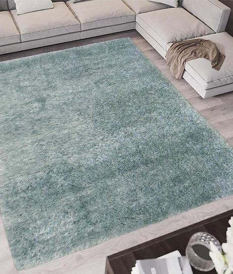 Soft blue Shaggy Rug on a wooden floor, enhancing the living room's comfort and style