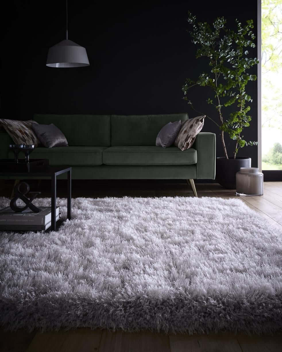 Soft Shaggy Rug in Silver Grey on Wooden Floor in Modern Living Room with Green Sofa