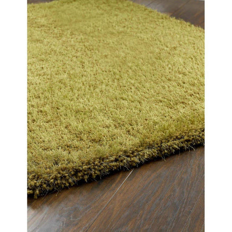 Soft green shaggy rug with a plush texture, perfect for adding warmth to any room