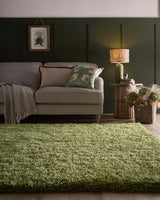Luxurious green shaggy rug perfect for adding warmth and comfort to your living room decor