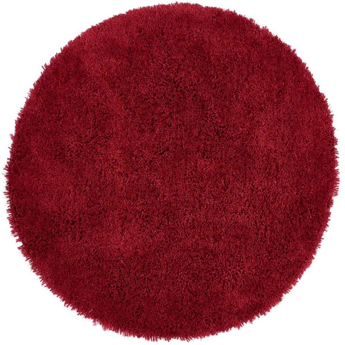 Red Shaggy Rug in a circular design, perfect for adding warmth to any room