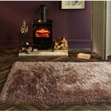 Plush Shaggy Rug in soft neutral tones placed in a cosy living room setting