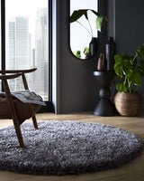 Stylish round grey shaggy rug perfect for modern living rooms and adding comfort to any space