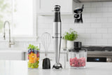 Sharkoon Hand Blender with whisk, chopper, and fresh fruit in a glass on a kitchen counter