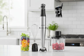 Sharkoon Hand Blender with whisk, chopper, and fresh fruit in a glass on a kitchen counter