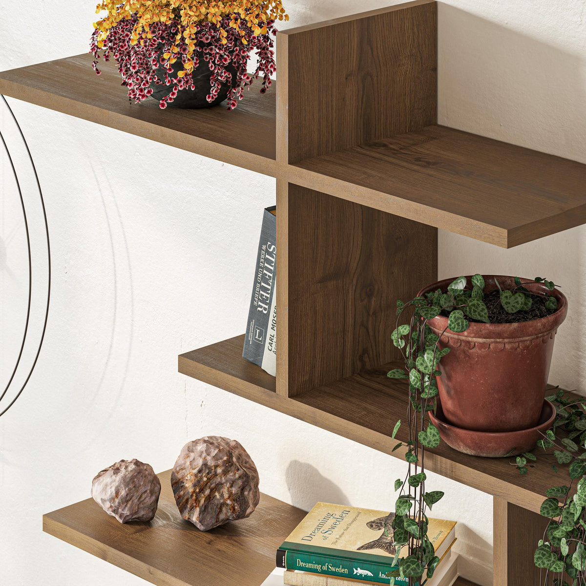 Stylish Decortie floating shelf in wood finish, ideal for displaying plants and decorative items