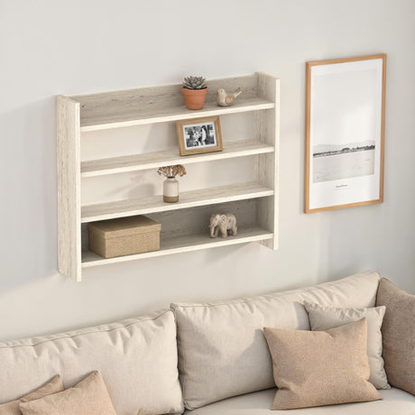 Decortie wall shelf with three shelves and decorative items, perfect for modern home decor